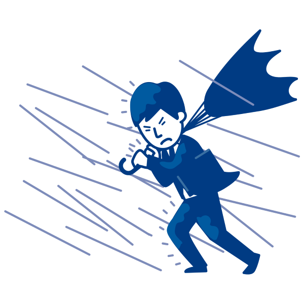 大雨の中の人